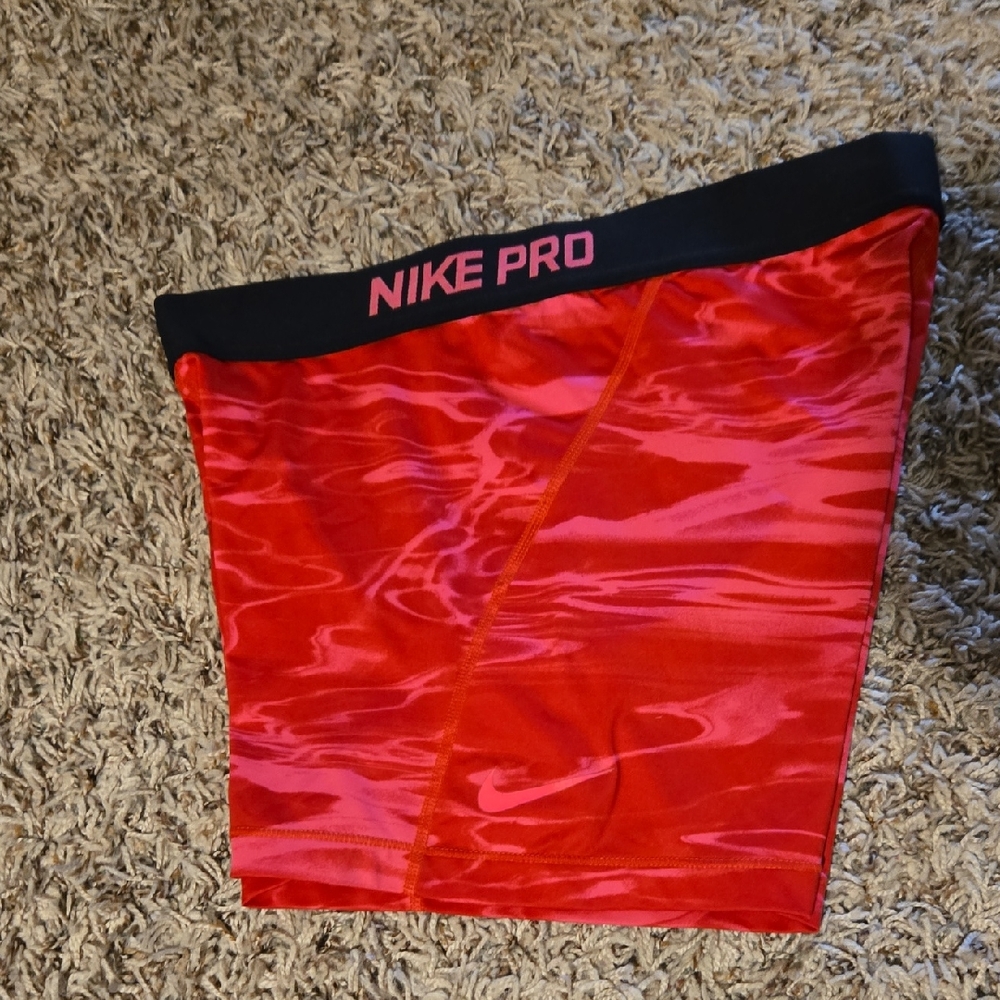 Nike Pro Red Compression Shorts with Black Waistband and Pink Logo